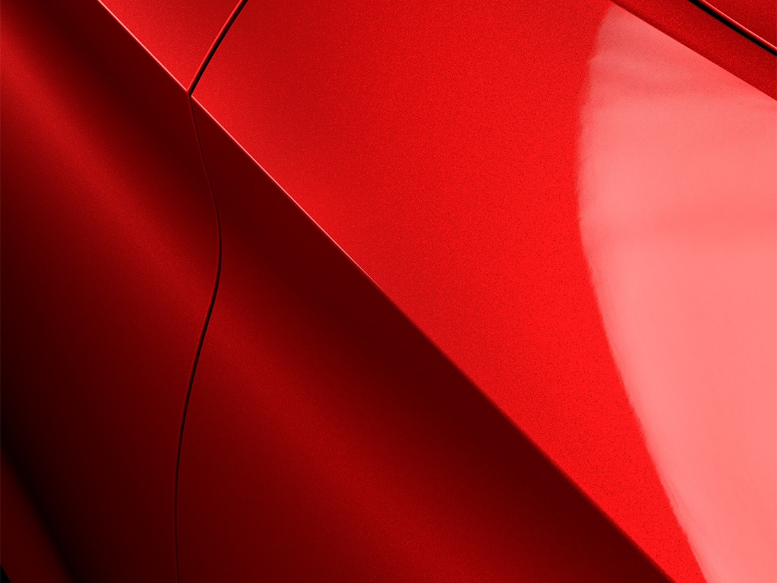 Seat leon sportstourer fr en rouge désir avec une finition métallique spéciale, gros plan.