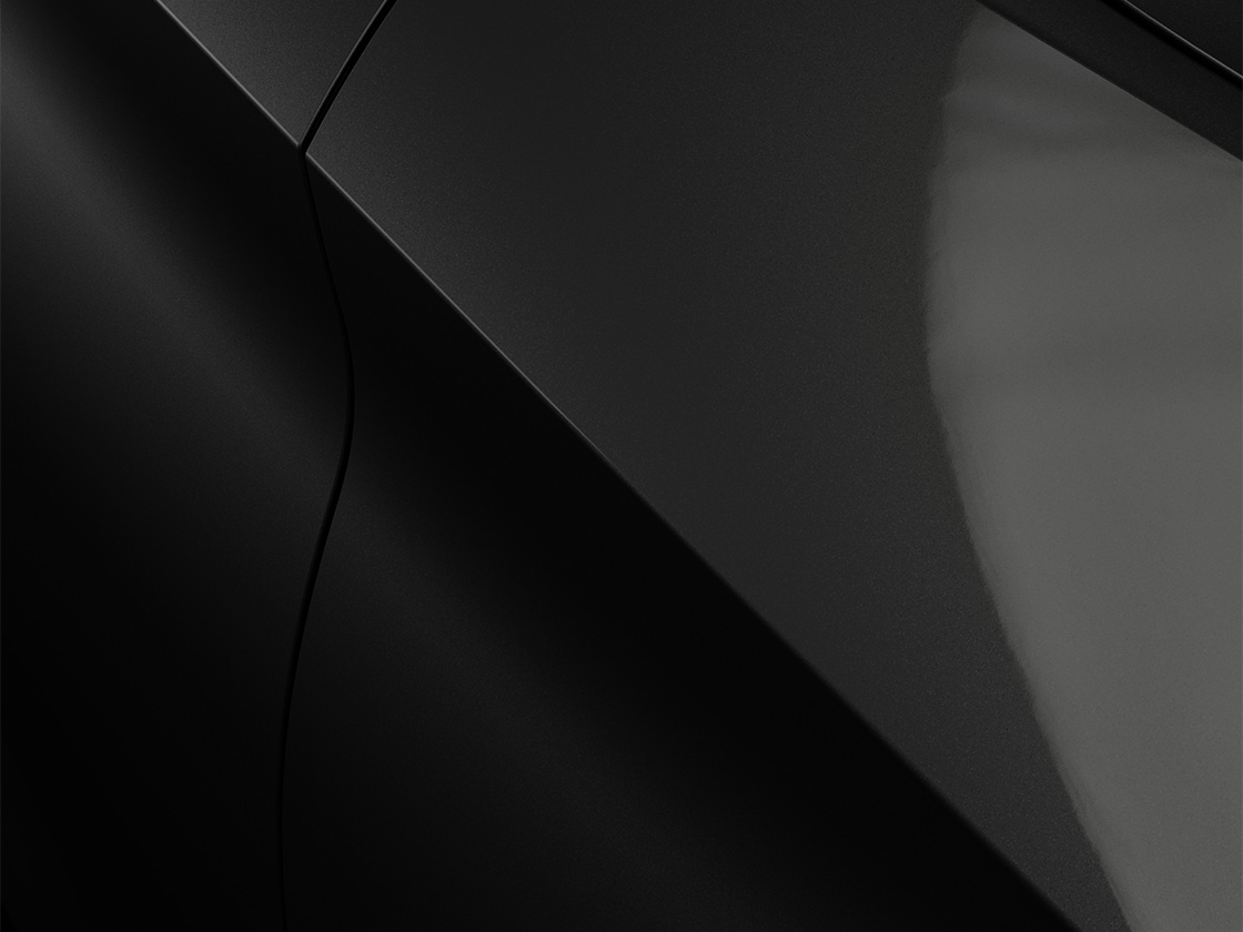 Seat leon sportstourer fr en noir minuit avec une finition métallique, gros plan.